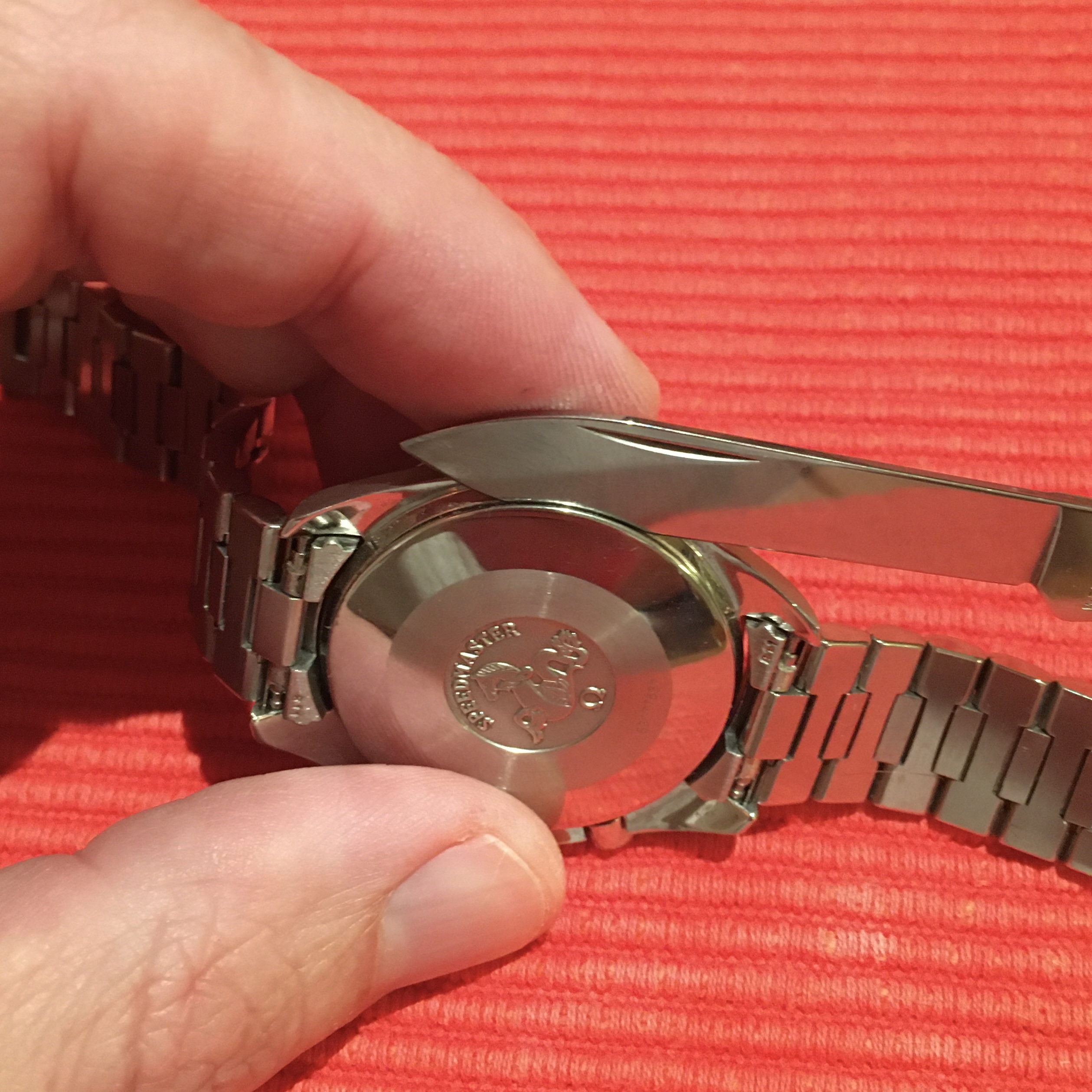 Opening an Omega Speedmaster Automatic Day Date 3520.50.00 Watch